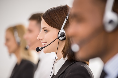Telemarketing services agent talking on a headset